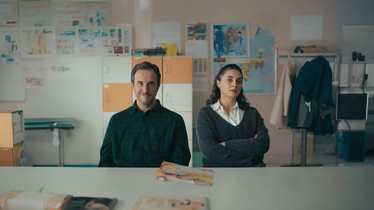 Click to play poster