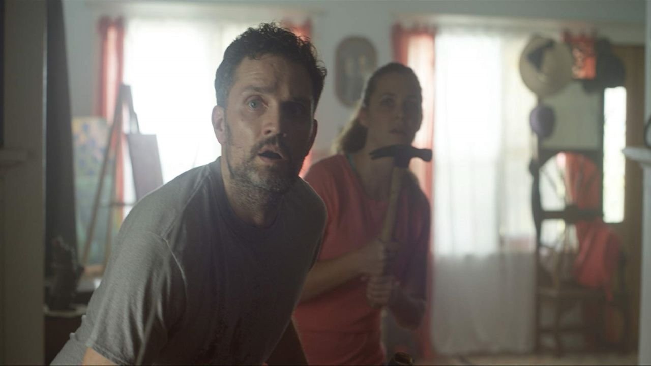 Click to play poster