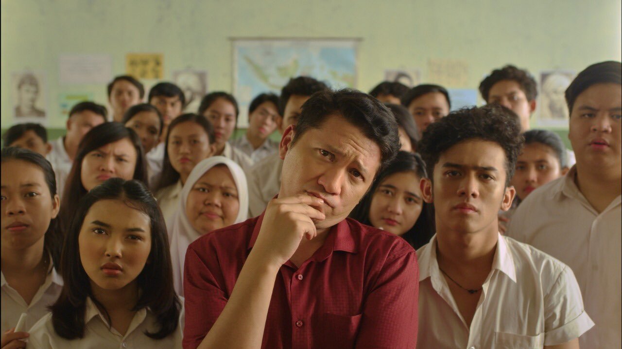Click to play poster