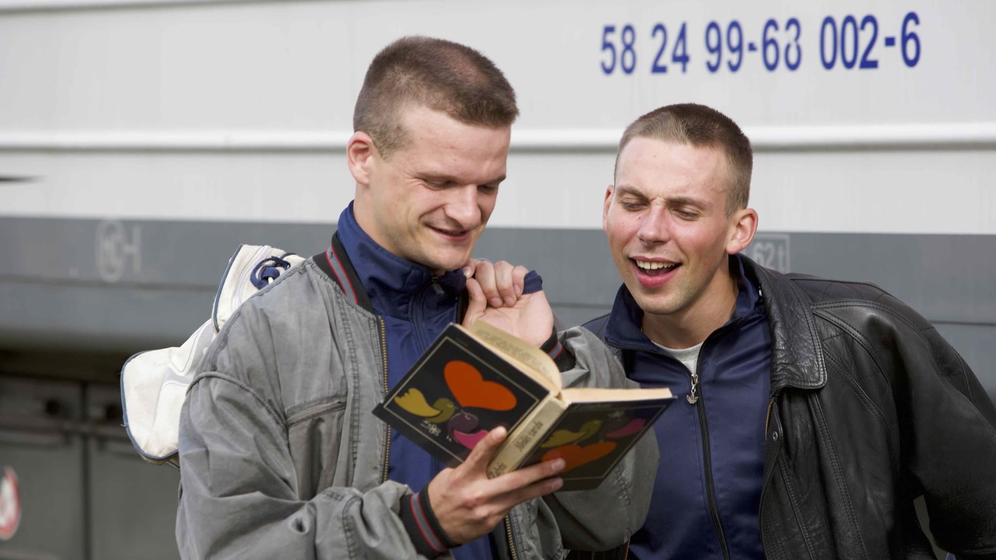 Click to play poster