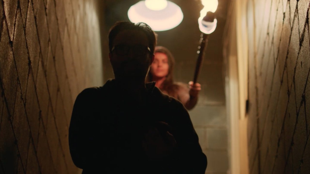 Click to play poster